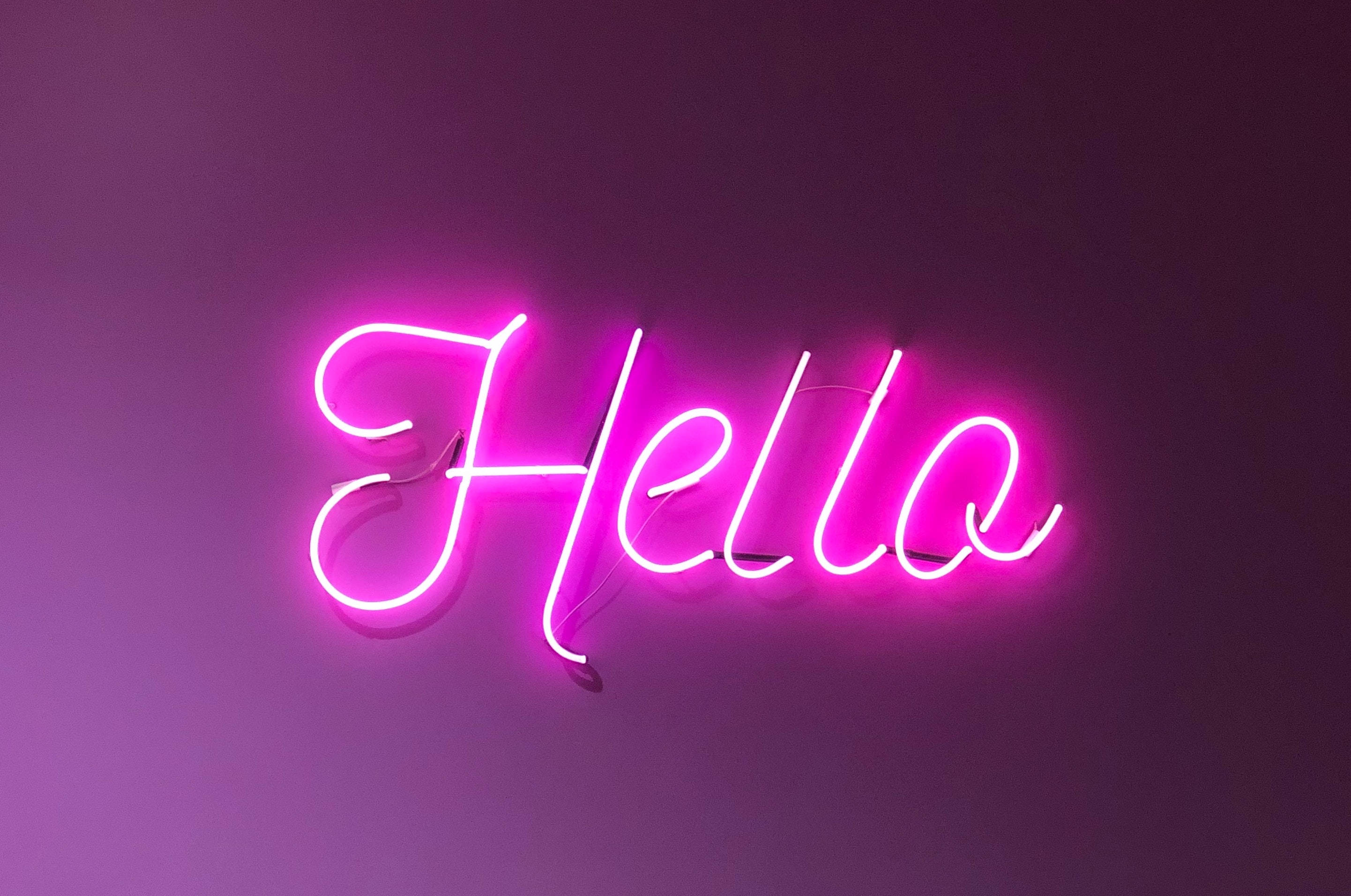 neon sign that says hello